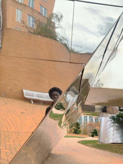 me reflected off a stata building