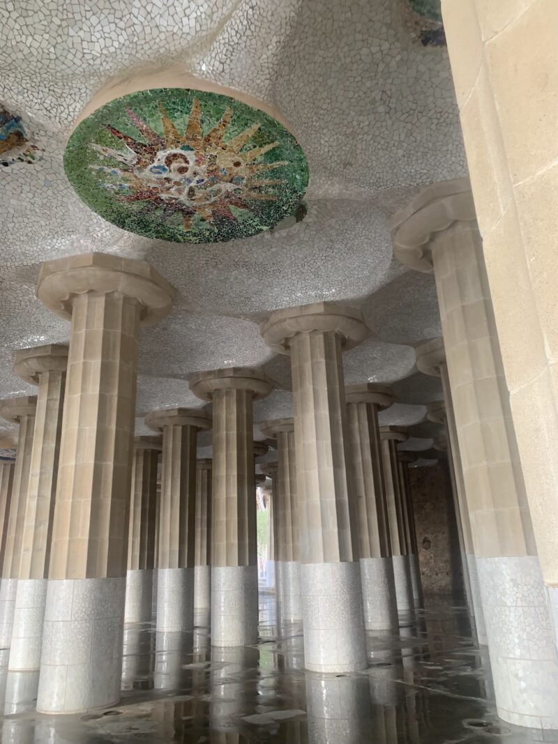 green ceiling medallion above stone columns