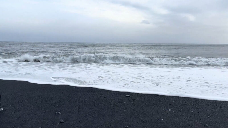 black sand beach & ocean