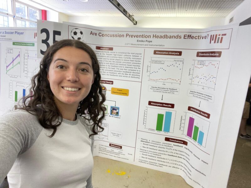 Selfie of presenter with her poster.