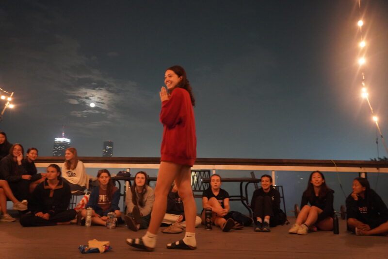 Team gathered in circle.