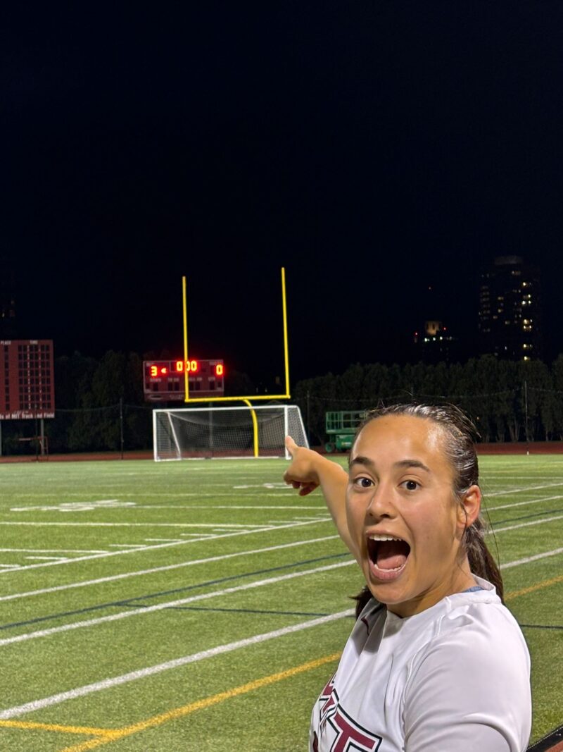 Player at pointing scoreboard saying 3-0.