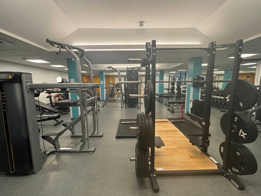 a picture of a large gym with many machines