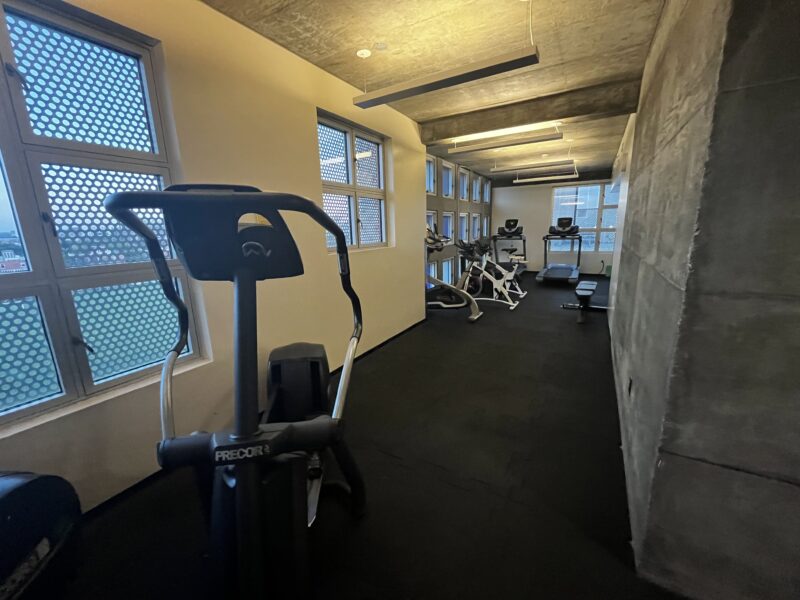 picture of a treadmill in a long narrow room