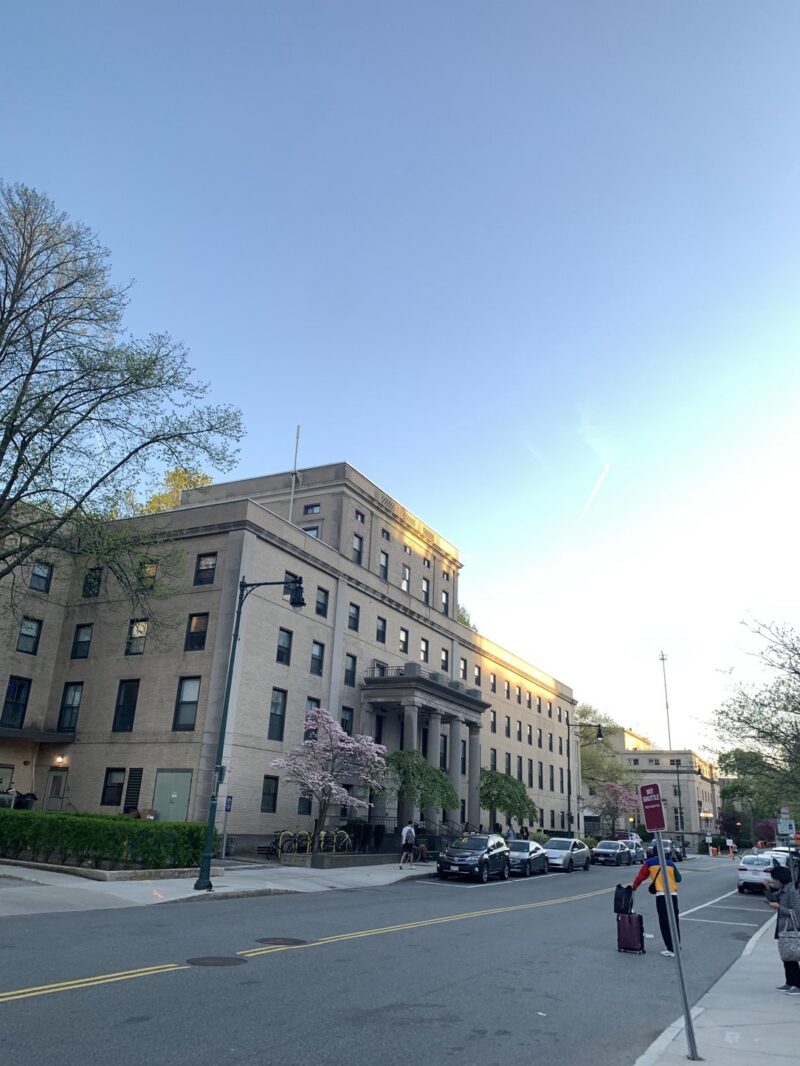 a building on east campus, gilded with light.