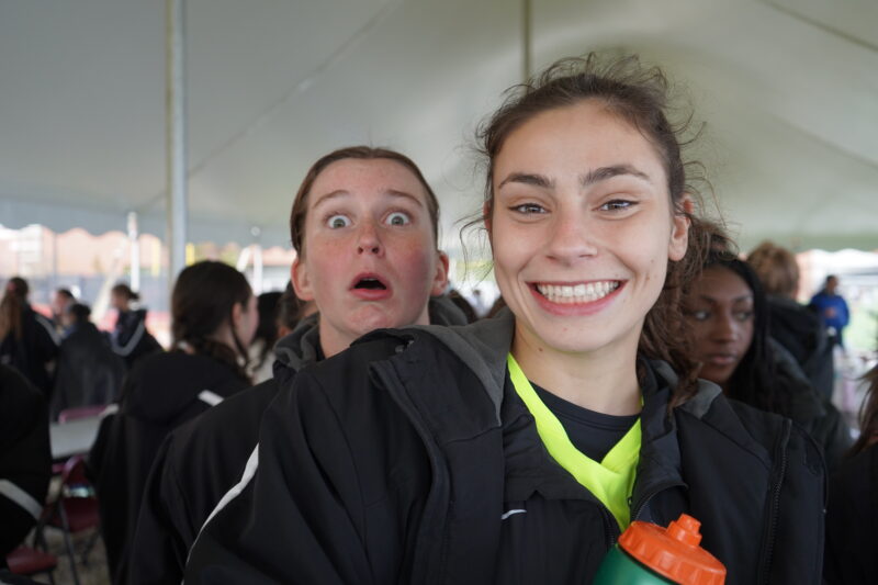 Two players smiling together.