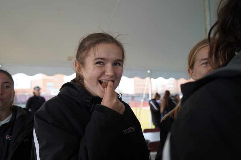 Player smiling while eating.