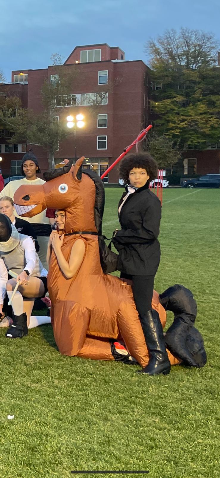 Player dressed up as an equestrian and a horse.