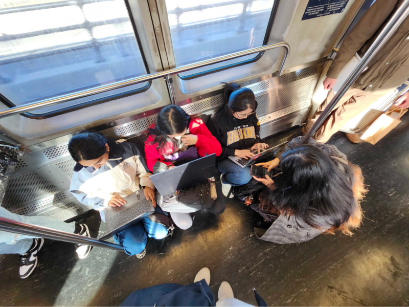 people typing on the T