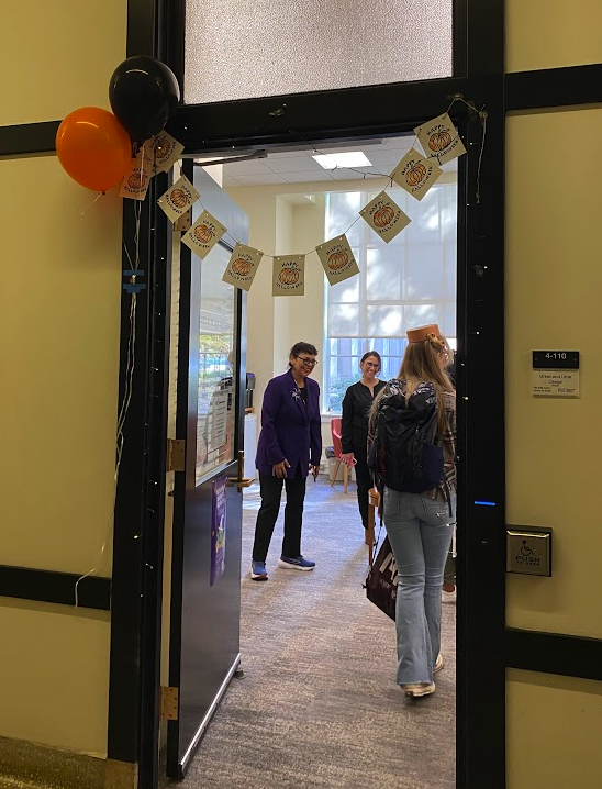 doorway decorated with halloween signage