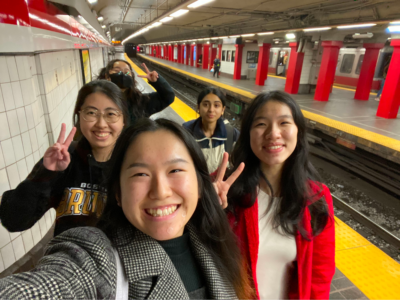 selfie of 5 people at a T stop 