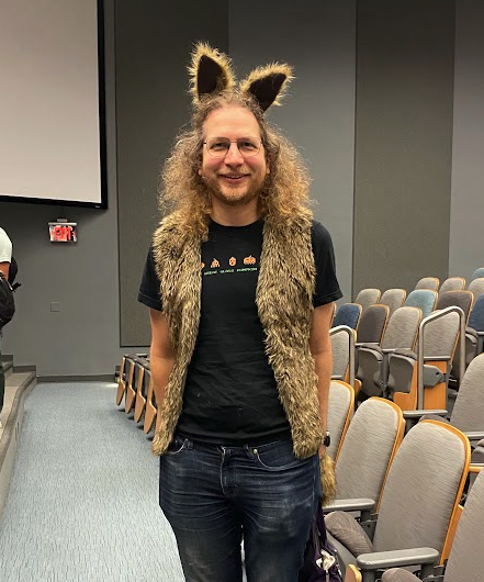 person standing with fur coat and furry ears on