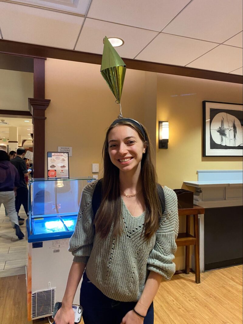 person wearing a sims diamond headband