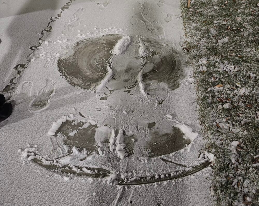 snow angel on the sidewalk