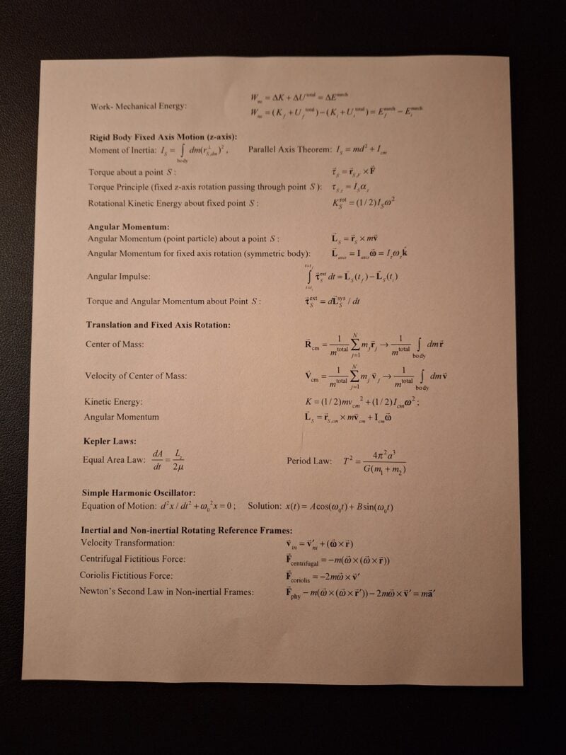 The backside of the equation sheet for mechanical physics, showing general equations for rigid body motion, angular momentum, translation/fixed axis rotation, Kepler's laws, simple harmonic oscillators, and non-inertial reference frames.