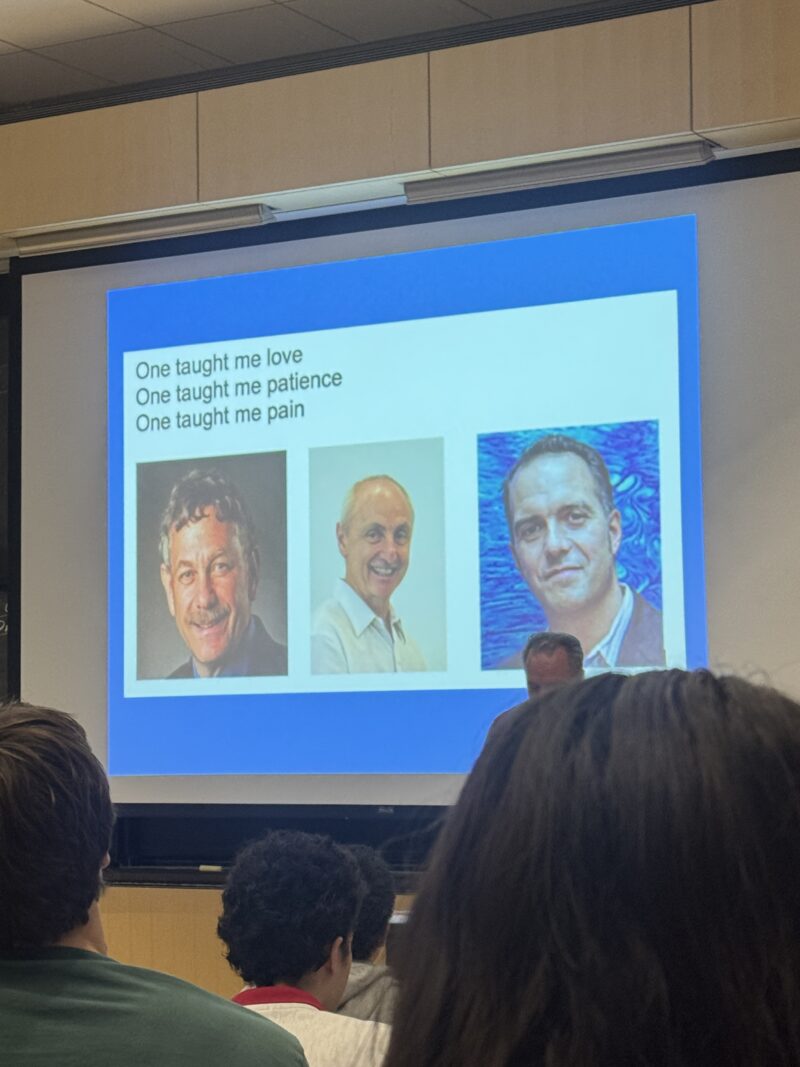 Photo of a lecture slide highlighting three pictures of MIT professors with captions that say: