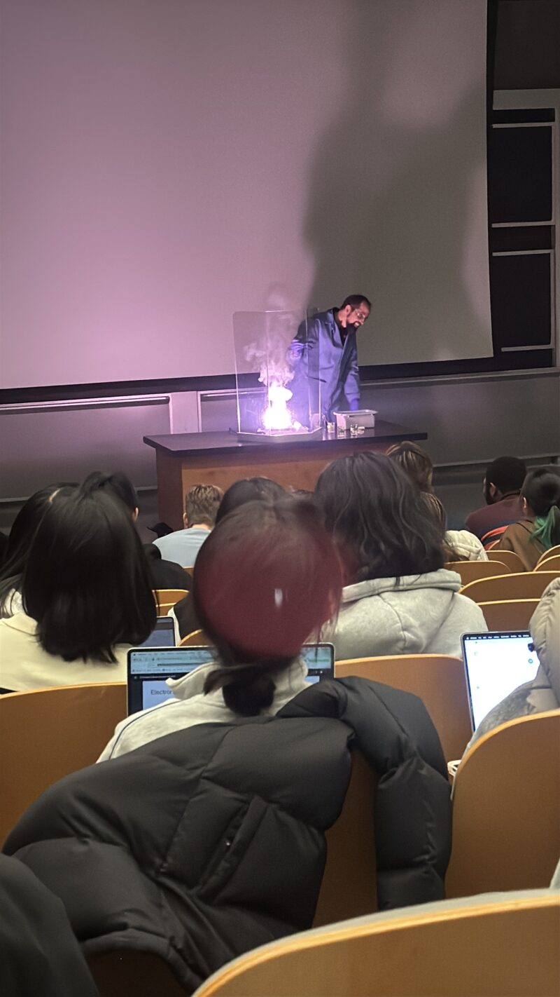Photo of chemistry demo that resulted in a bright burst of purple light