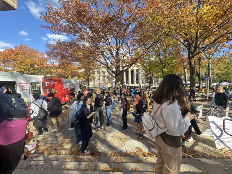 Photo of students standing in front of Lobby 7 waiting in line for ice cream and boba.