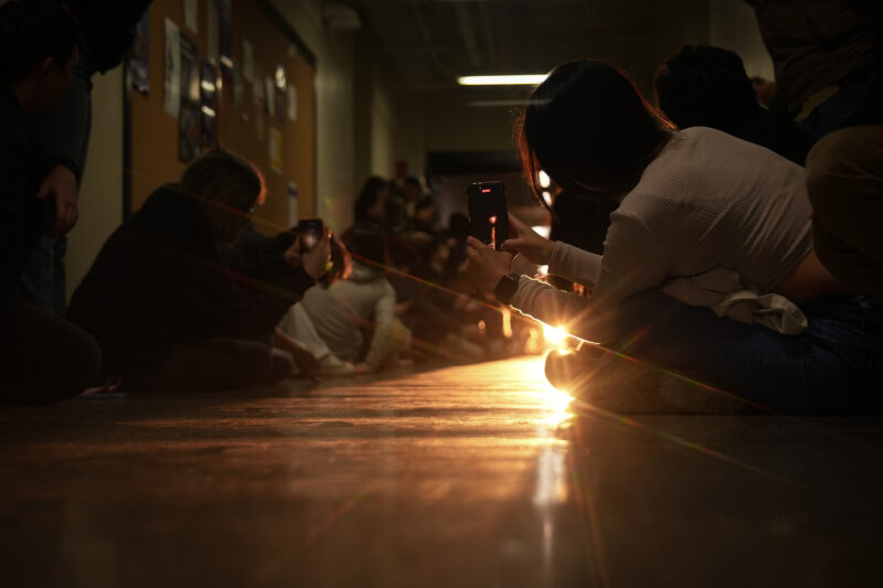 Photo of the hallway as people clear the line of sight for the window.