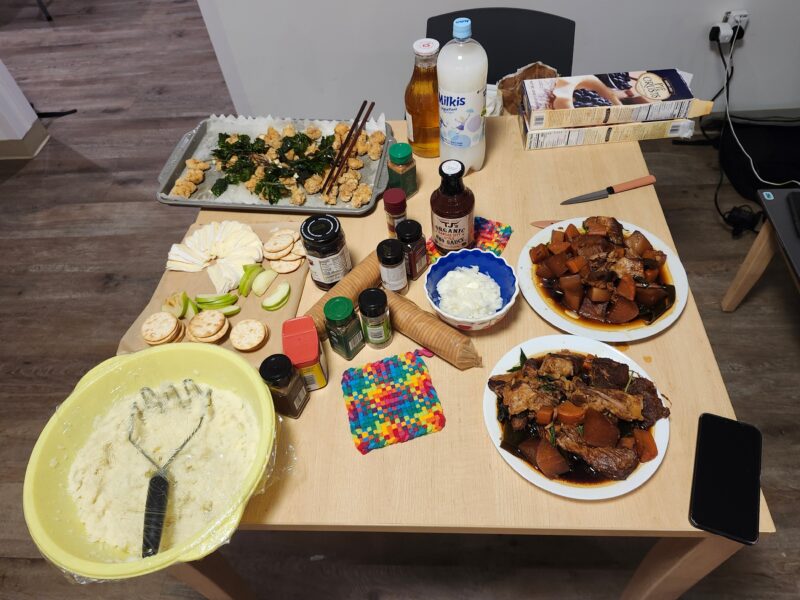 various dishes and ingredients laid on a table