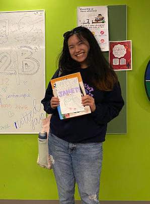 person standing with a card