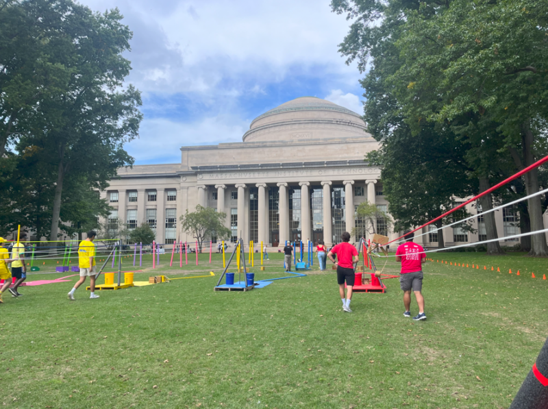 MIT dome overlooking green field with different obstacles on it.