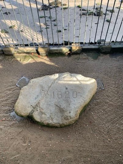 A large stone marked