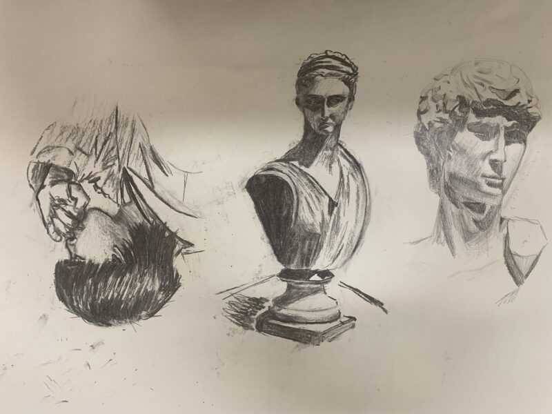 The image is a pencil drawing on a light background, divided into three sections. The top left shows a male figure in profile, dark hair and clothing visible, hand raised to the mouth. The center features a classical bust sculpture, emphasizing light and shadow on the draped fabric. The bottom consists of two heads, displaying strong facial contours with varied shading techniques, enhancing their expression and dimensionality.