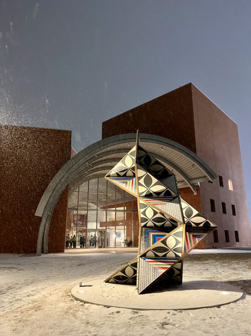 A view of the Linde Music Building and the sculpture