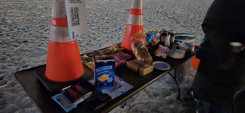 table with various smores ingredients
