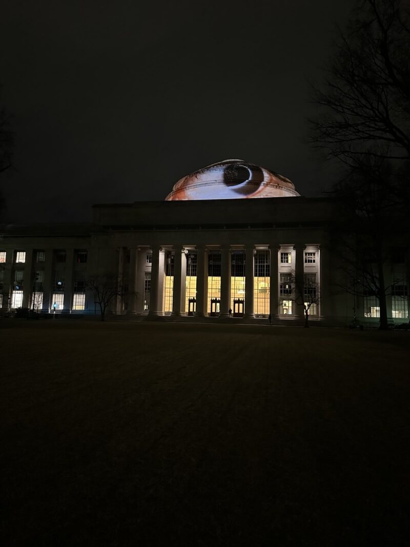 Another photo of the great dome at night, only this time a massive eye has been projected onto it, making it l
