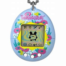 An egg shaped toy with a cartoon character on a screen in the middle.