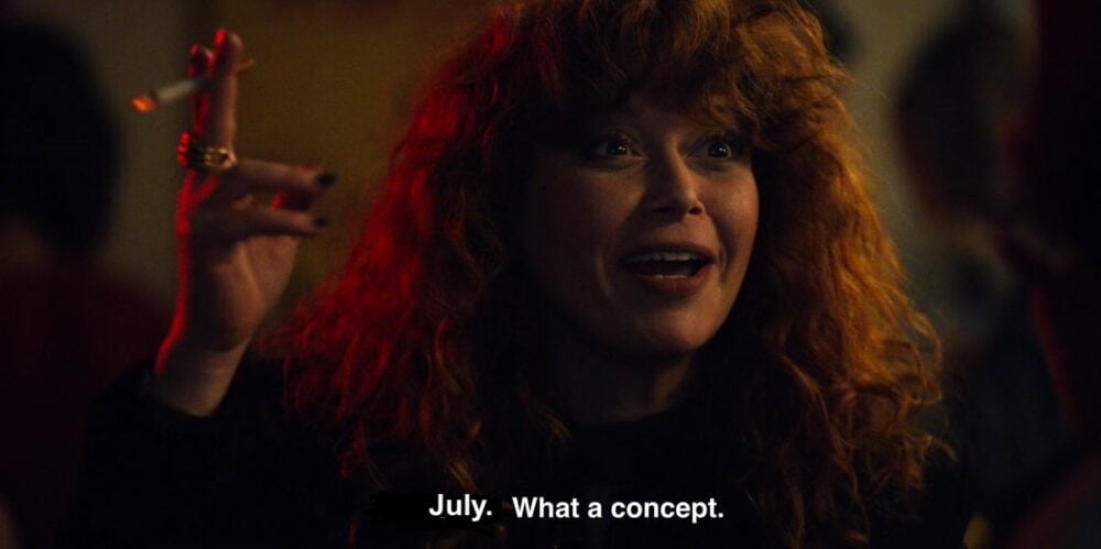 A screenshot of the show Poker Face where Natasha Lyonne's character is saying "Thursday. What a concept." with subtitles, only "Thursday." has been replaced with "July."