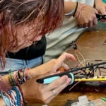 Student working on wiring project.