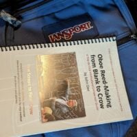 a book bout oboe reed making on a backpack