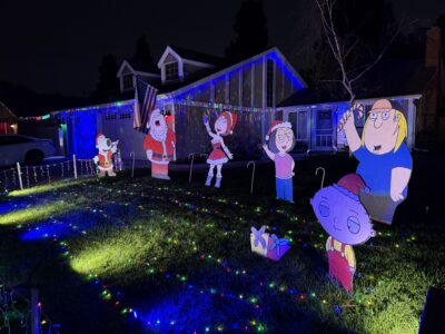 christmas family guy cut outs on a lawn