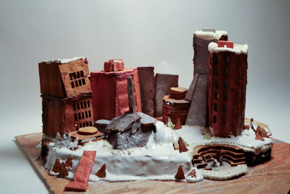 a gingerbread structure in the light