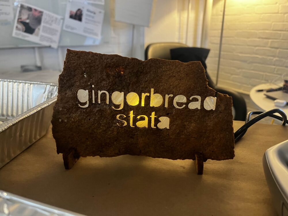 picture of a piece of gingerbread with "gingerbread stata" cut out of it