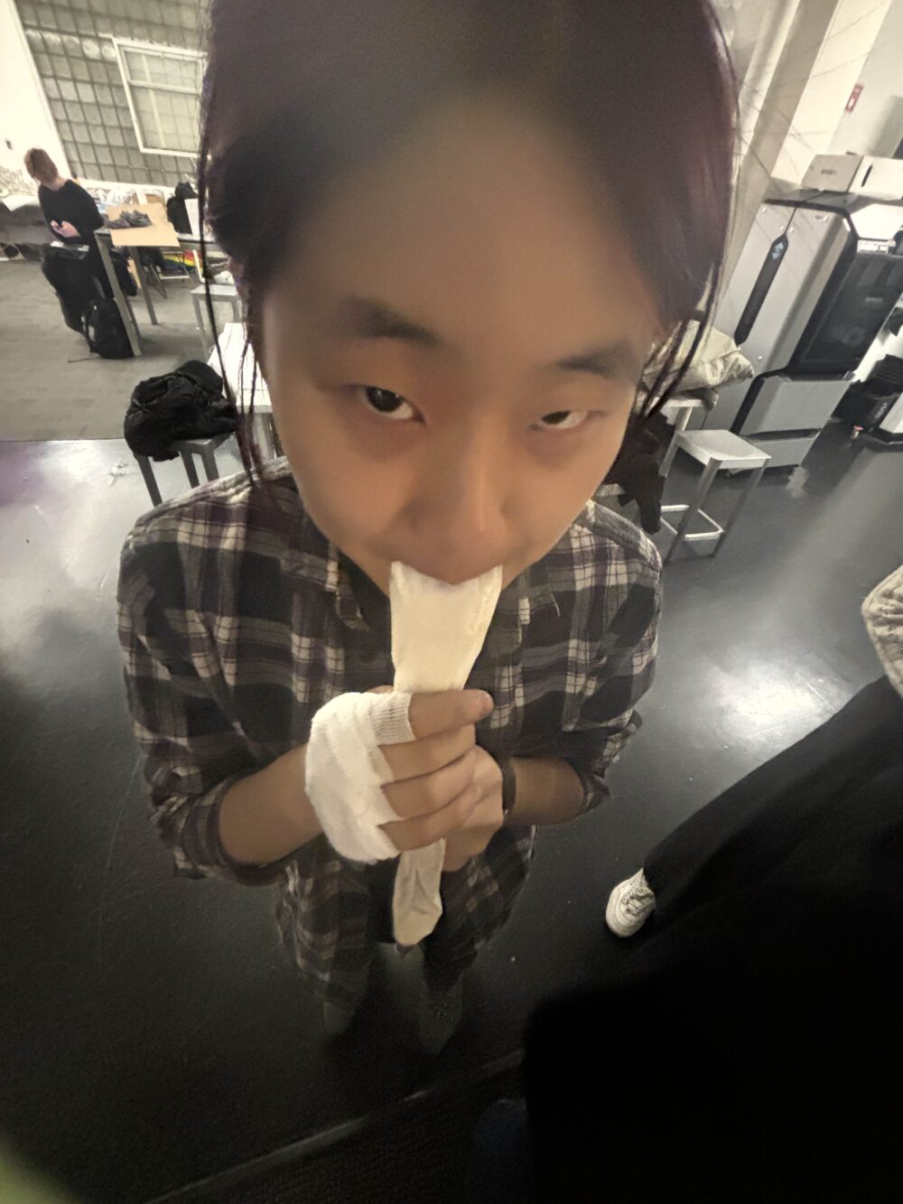 photo of someone from a top-down angle as they drink icing