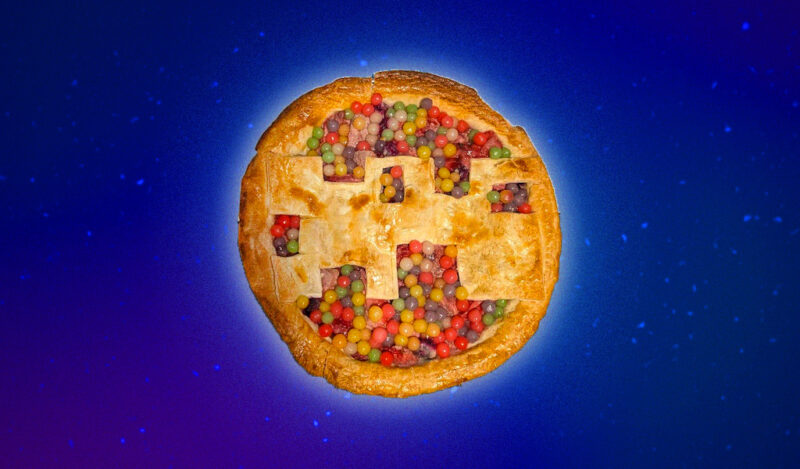 A pie with rainbow tapioca filling and the silhouette of Simmons as the top crust.