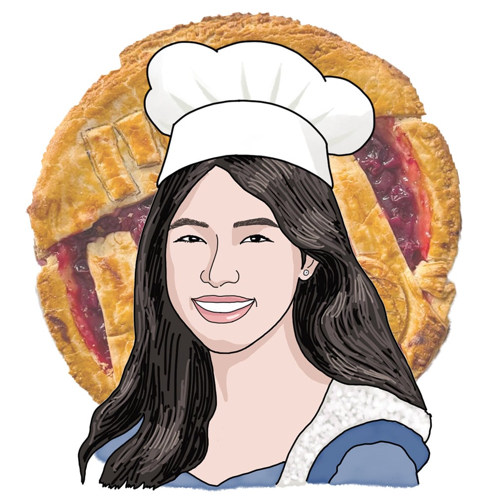 A head-and-shoulders illustrated portrait of Ellie in a chef toque and in front of a pie.