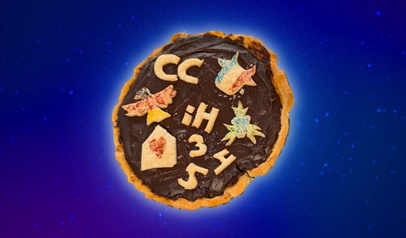 A chocolate pie with pie crust cutouts representing different living groups in New House