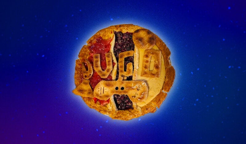 A three-colored pie featuring the letters V, G, O for Video Game Orchestra made out of crust.