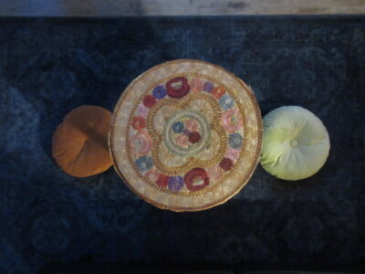 a carpet with a vintage nightstand