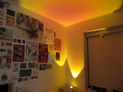 a college dorm with a sunset lamp