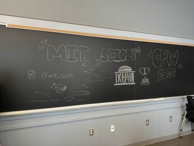chalkboard decorated with science olympiad logo, beavers, etc.