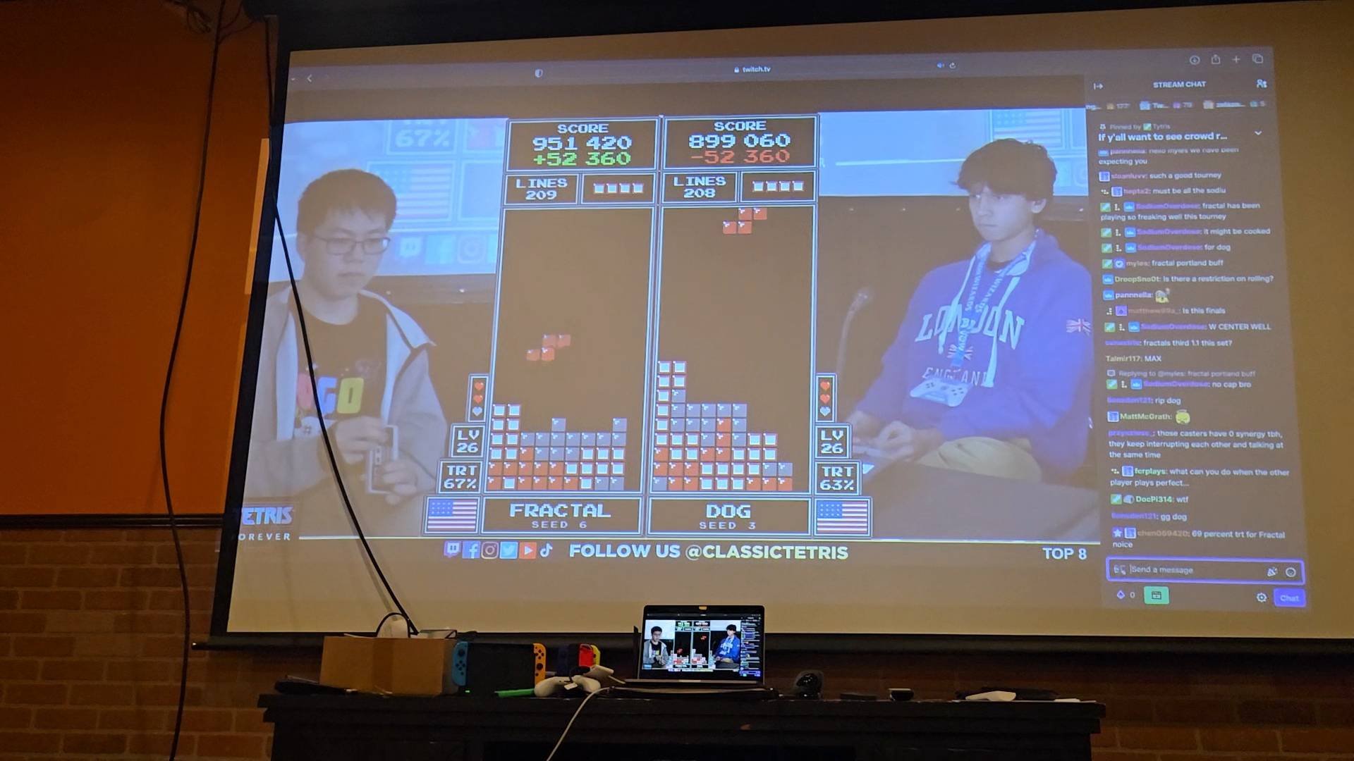 a picture of a projector screen showing fractal161 competing at tetris