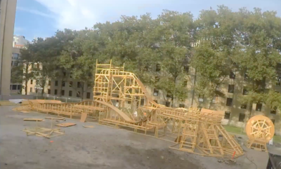photo of wooden roller coaster in progress from a medium distance