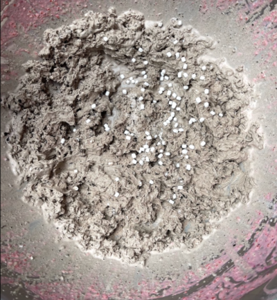Brownish-grey ice cream with marshmallows