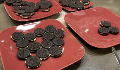 Oreos with orange, green, white and yellow filling